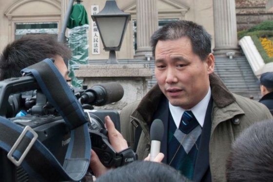 4 chinos continúan detenidos por apoyar a Pu Zhiqiang en el día de su juicio